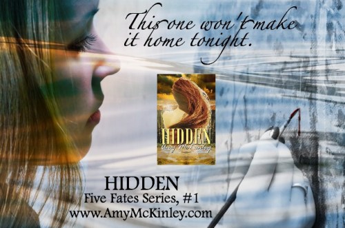 Young female artist painting in her studio.